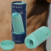 A mint Arcwave Pow Male Stroker, crafted from silicone, is positioned against a blurred background, highlighting its textured design, internal features, and cutting-edge suction control. Accompanying it is the elegant cylindrical packaging that captures the essence of the ultimate male stroker experience.